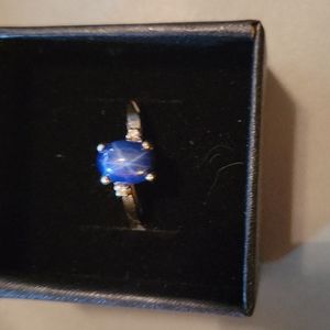 14k white gold blue star sapphire with accent diamond chips